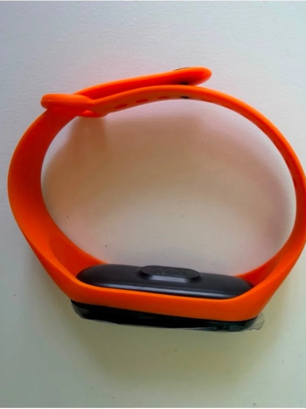 Replaceable Orange Silicone Smartwatch Band with Black Tracker Module